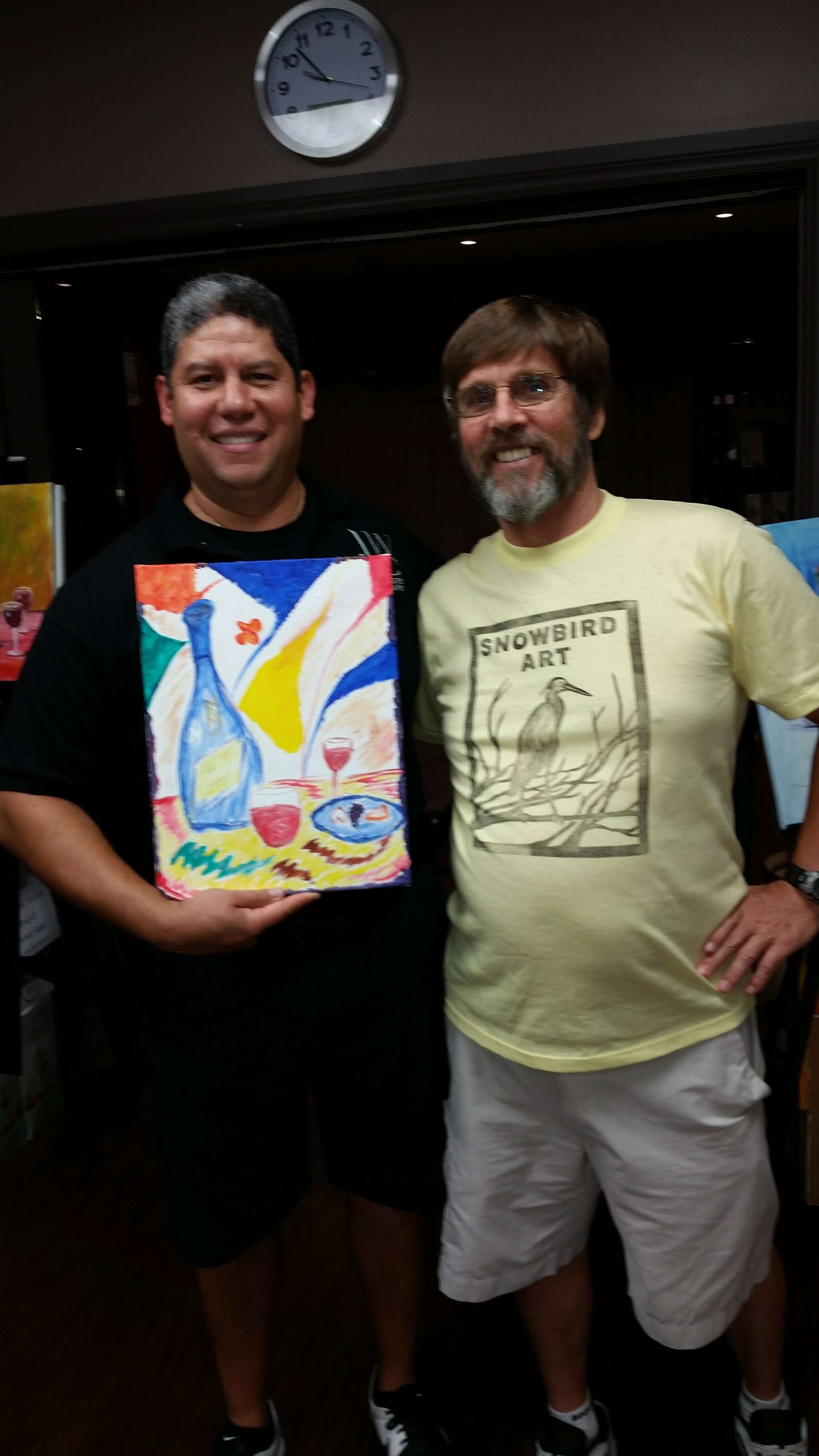 John and his painting coach, retired teacher, Marvyn Rivett.